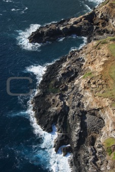 Rocky cliff on coast.