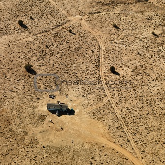 Trailer home in desert.
