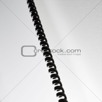 Curly telephone cord.