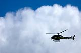 Helicopter silhouette in a cloud