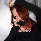 Woman on telephone.
