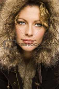 Woman with fur hood.