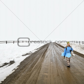 Woman with snowboard.