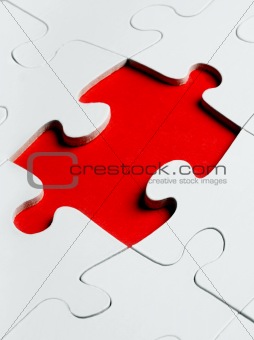 jigsaw puzzle with the missing piece