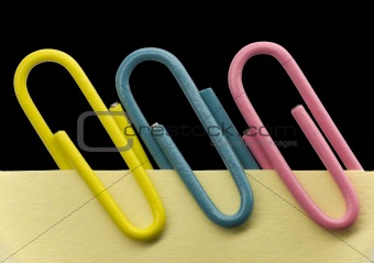 Paperclips on a note