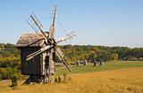 Old wooden windmill in autumn