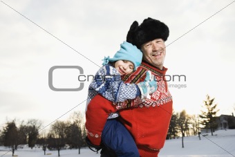 Man holding child.