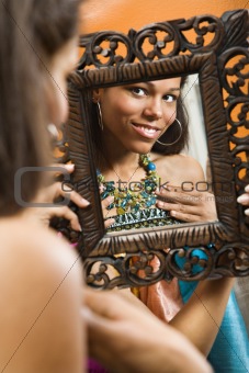 Woman in mirror.