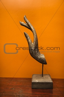 Carved wooden hand.