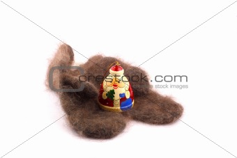 wooden russian santa claus on the downy mitten