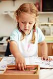 Cute little girl painting