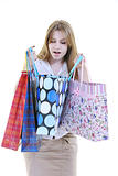 happy young adult women  shopping with colored bags