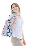 happy young adult women  shopping with colored bags