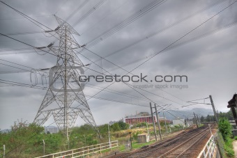 train track and power tower