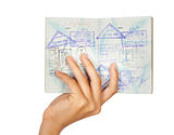 Hand showing passport, close-up shot