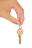 Female hand holding a key