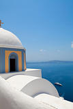 Old church dome and view of mediterranean sea in Santorini