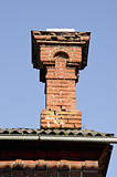 Antique red brick chimney.