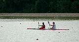 Rowers in a boat in line