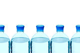 plastic bottles of mineral water in a row