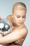 blond with creative make up an shining ball