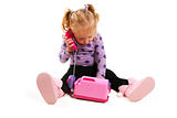 Little girl playing with phone