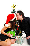 Couple by Christmas tree