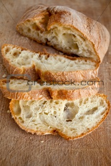 sliced homemade bread on wooden board