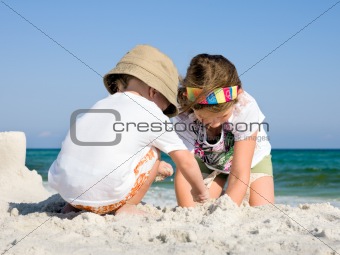 Kids Building Sandcastle on a Beach