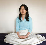 Asian woman in meditation