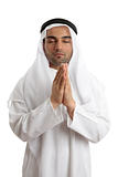 Arab man praying to God