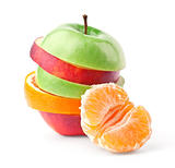 Layers of apples and oranges with slice of tangerine