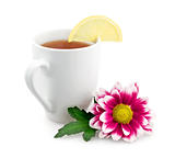Hot tea with lemon and flower