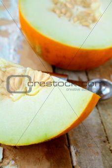 Honey yellow melon  on a wooden table