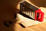 Grater On Cutting Board