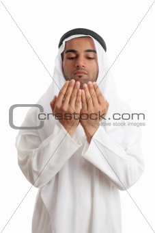 Arab man with open palms praying