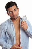 Man with cologne while dressing