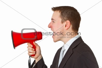 Businessman yelling through a megaphone
