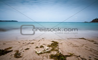 Long exposure photo of beach and sea