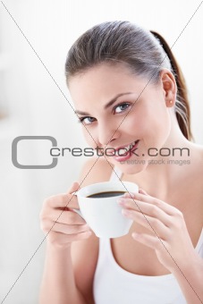 An attractive woman with coffee