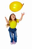 Little girl chasing balloon on white background