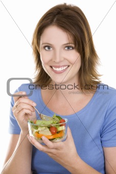 casual woman eating salad