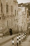 Elderly  jewish man climbing to the Old City of Jerusalem