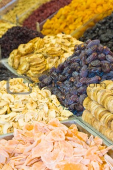 Colorful dried fruits and dates