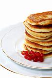 Pancakes with red currants.