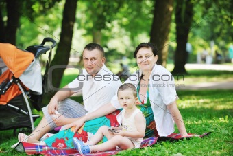 Family at park relaxing and have fun