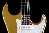 Guitar Electric Gold Isolated Over Black