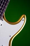 Gold Guitar Isolated on Green