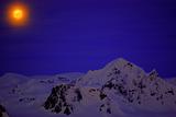 Moon on the dark blue sky of Antarctica