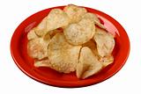 Potato crisps on a plate with clipping path